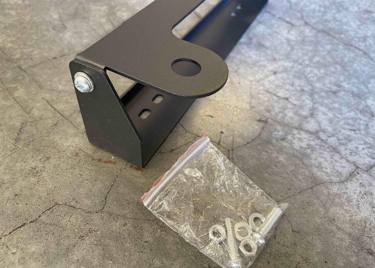 Backwoods Adventure Mods Flip Up Front License Plate Holder - Hawse Fairlead